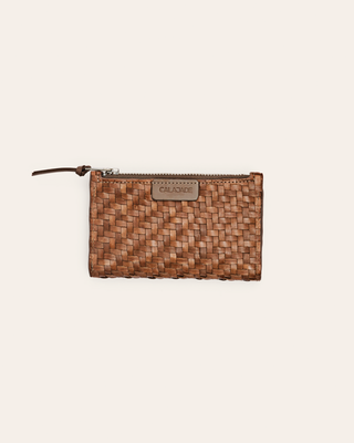 Woven brown leather wallet with a visible brand logo on a beige background
