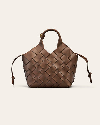Cala Jade brown woven handbag on a beige background