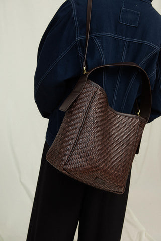 Cala Jade IWA Fudge leather bag on model 3