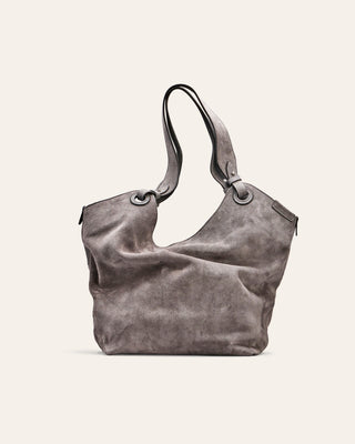 Cala Jade grey suede soft shoulder bag on a beige background