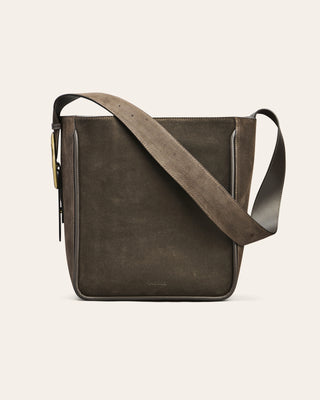 Cala Jade Masago Ebony suede brown leather bag on a beige background