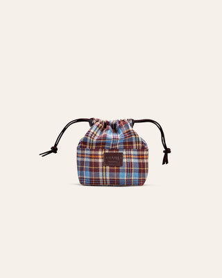Plaid drawstring pouch on a light beige background