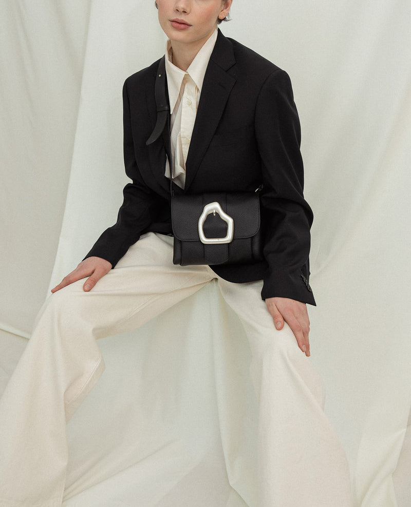 Cala Jade black Nami mini shoulder bag on model